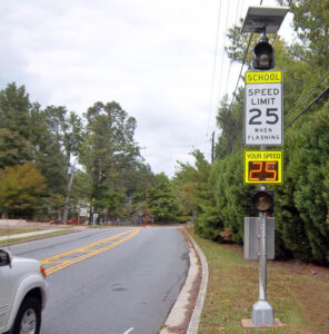 Radarsign School Zone Safety System with front-mounted flashing beacons