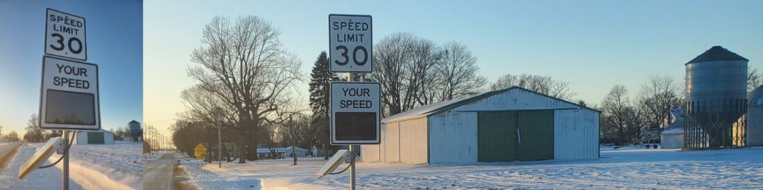 Radarsign speed signs displayed in a snowy rural area, showcasing their visibility and functionality in winter driving conditions.